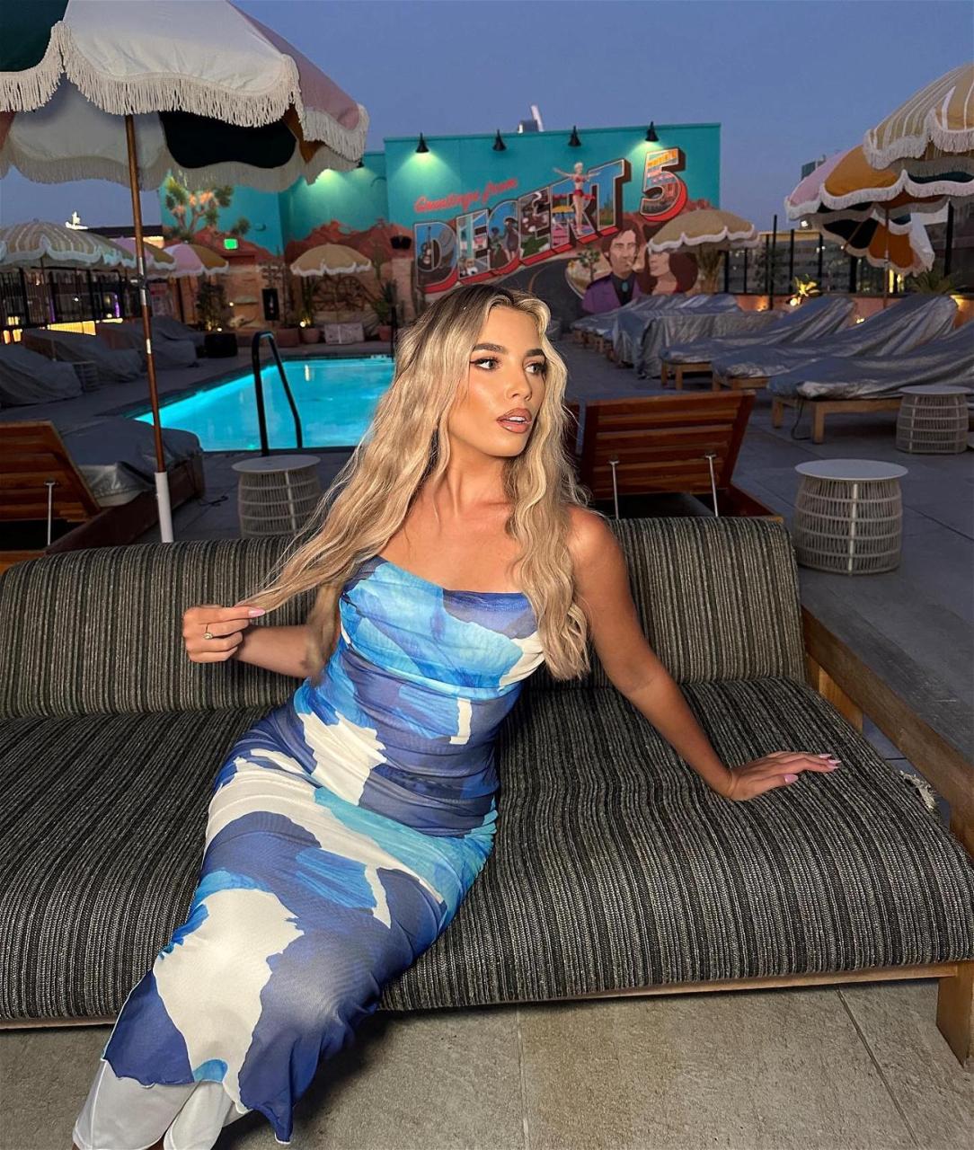 Lana Jenkins in a blue tie-dye dress