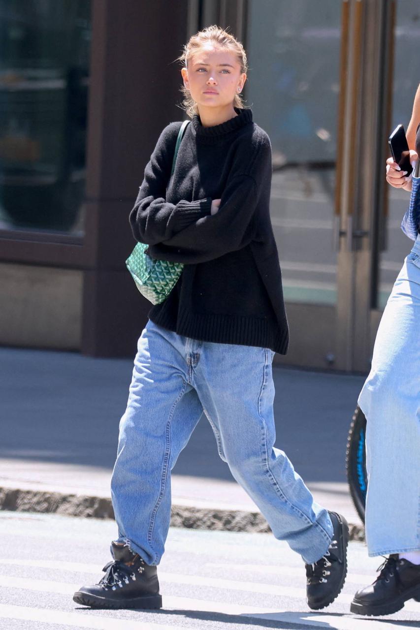 Leni Klum wears a black sweater and jeans while stepping out with friends  in New York