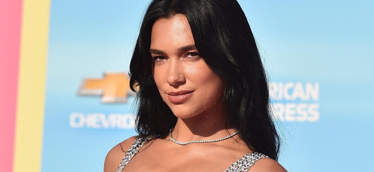 Dua Lipa ‘Raves Into 28th Year’ In The Tiniest Bikini Top Ever