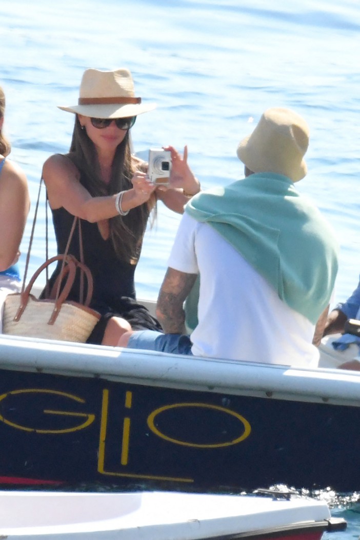 Victoria and David Beckham enjoyed a boat trip as they try to put the vicious restaurant fight behind them