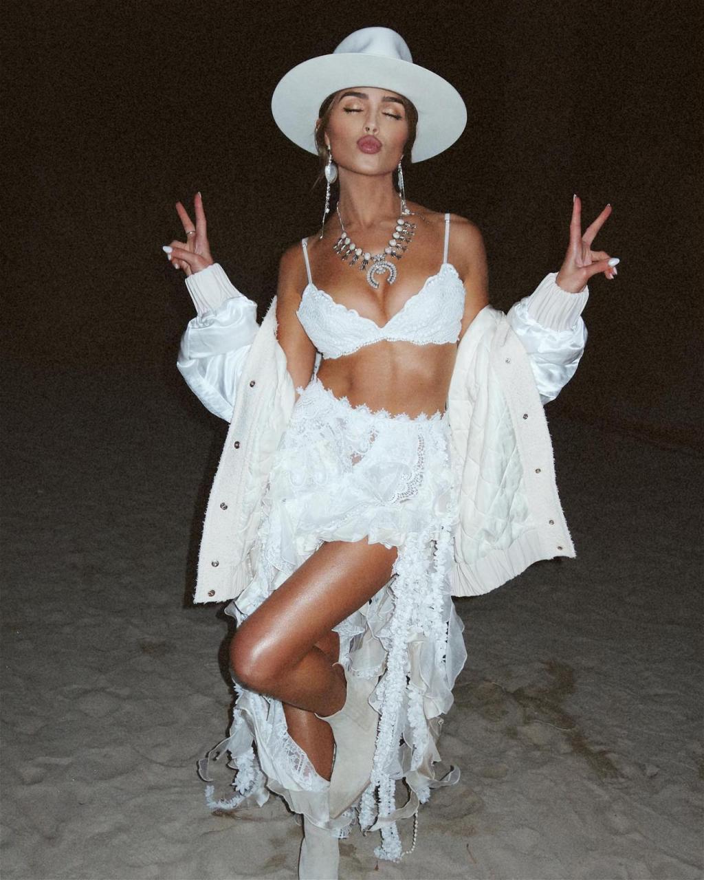 Olivia Culpo Is ‘Giving Bride-Cella’ At Coachella In White Lingerie