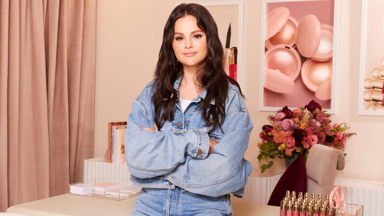 selena gomez standing in rare beauty office