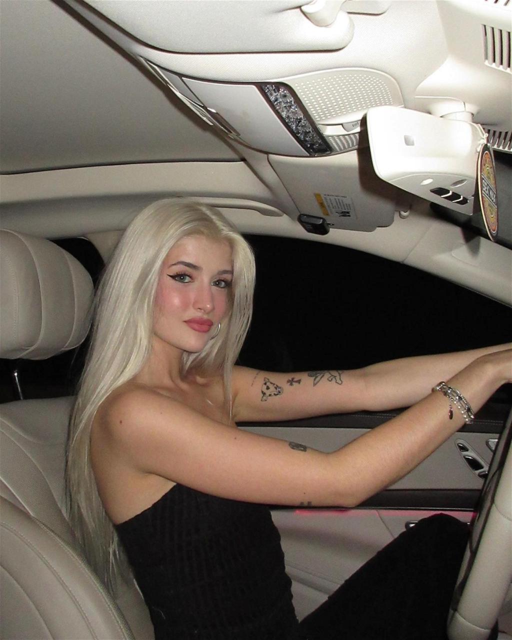 Sami Sheen Poses In The Car In A Black Crop Top