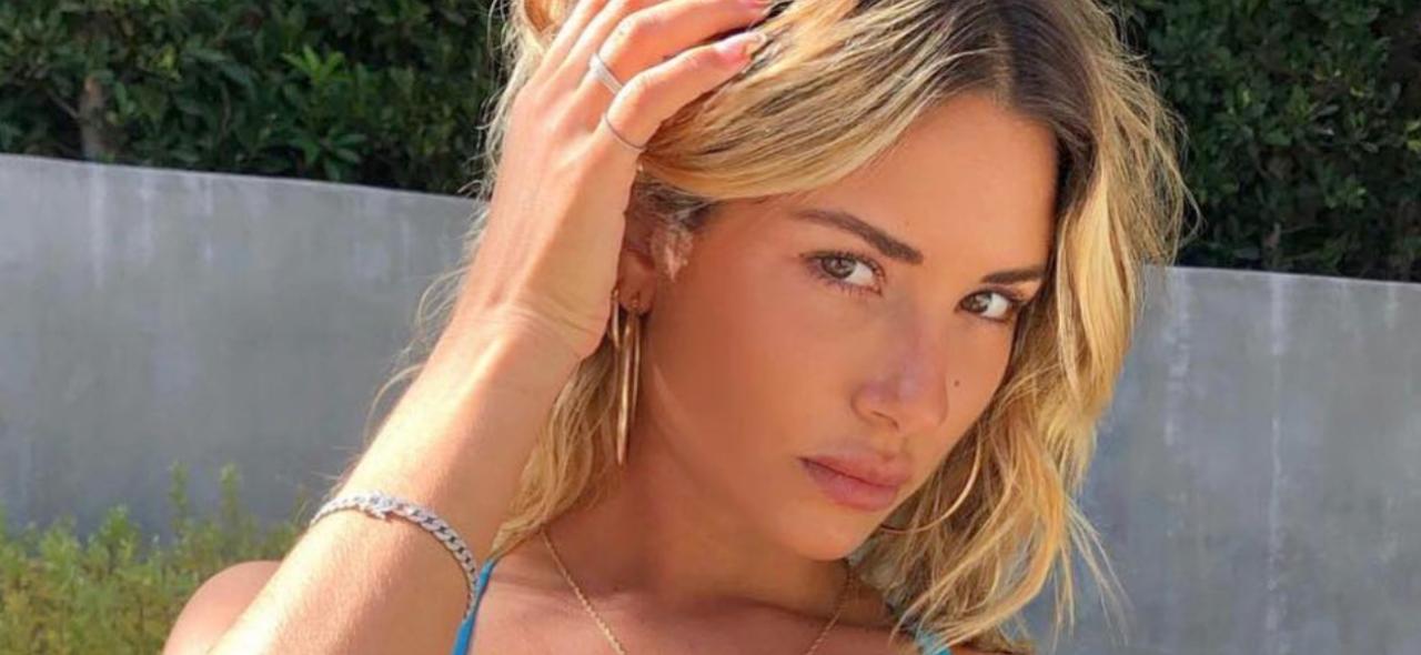 Sierra Skye Lets Top Slip Down On Sun-Drenched Balcony