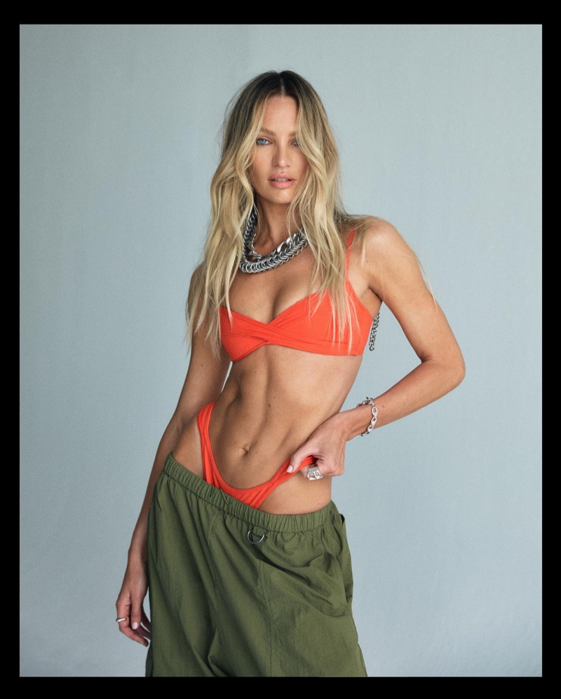 Candice Swanepoel effortlessly pairs Tropic of C’s designs with cargo pants and combat boots