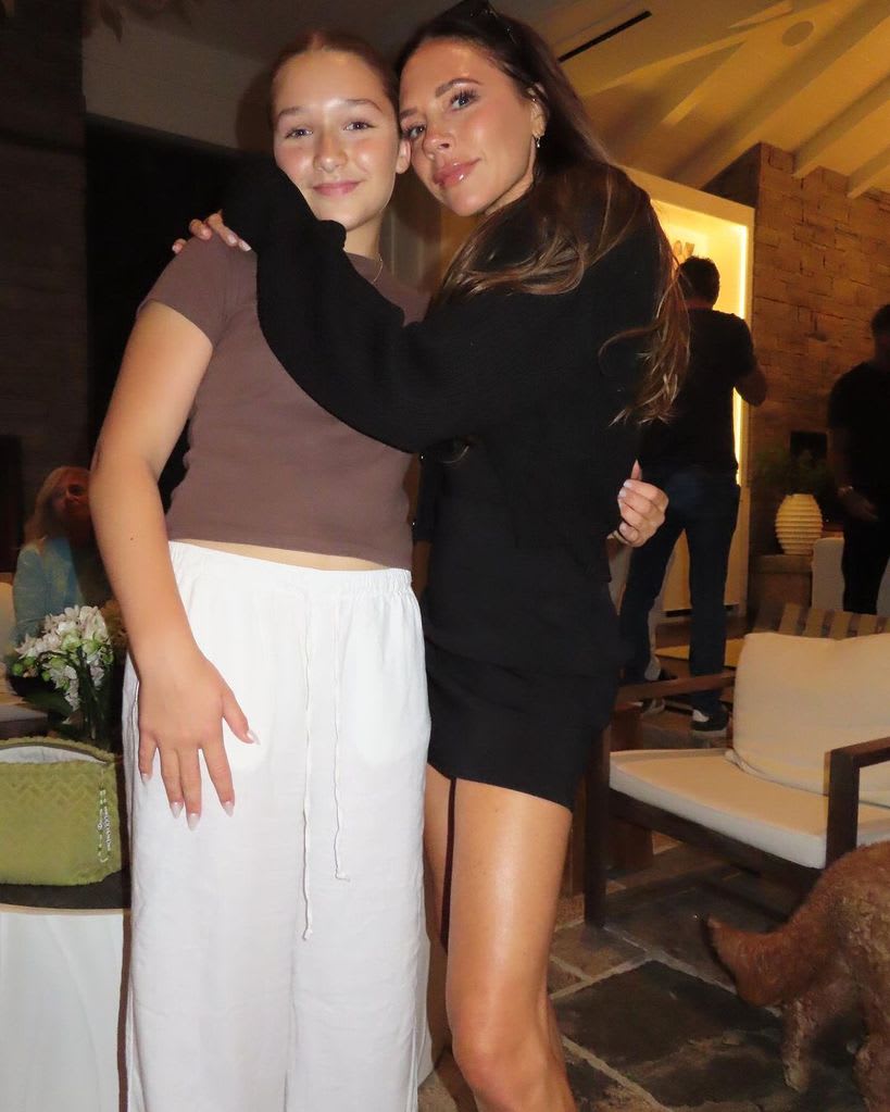 victoria beckham hugging daughter Harper 