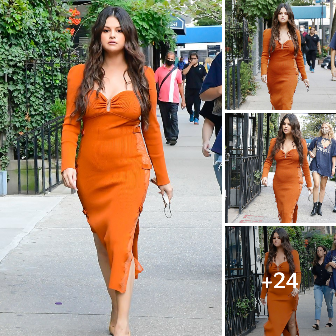 Selena Gomez is showstopping in an orange dress with sheer lace sides as she hits the town in NYC