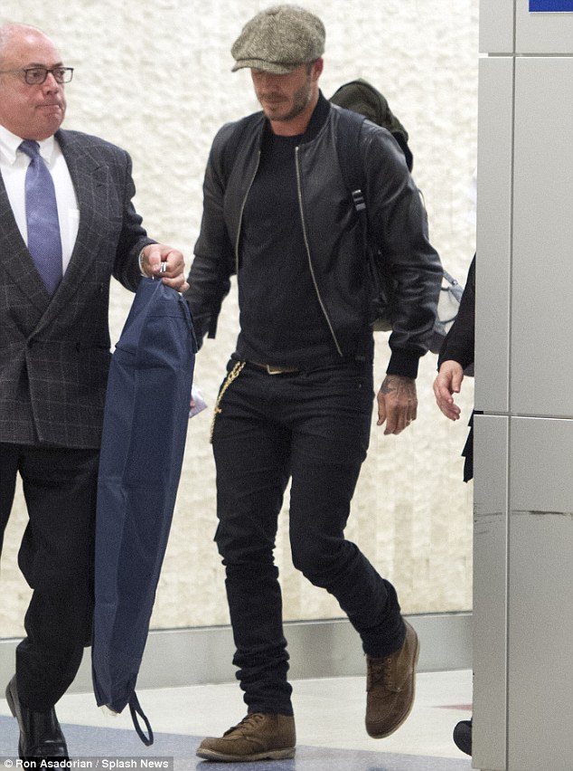 Touching down: David looked stylish in an all-black ensemble as he arrived at JFK Airport in New York City the previous day