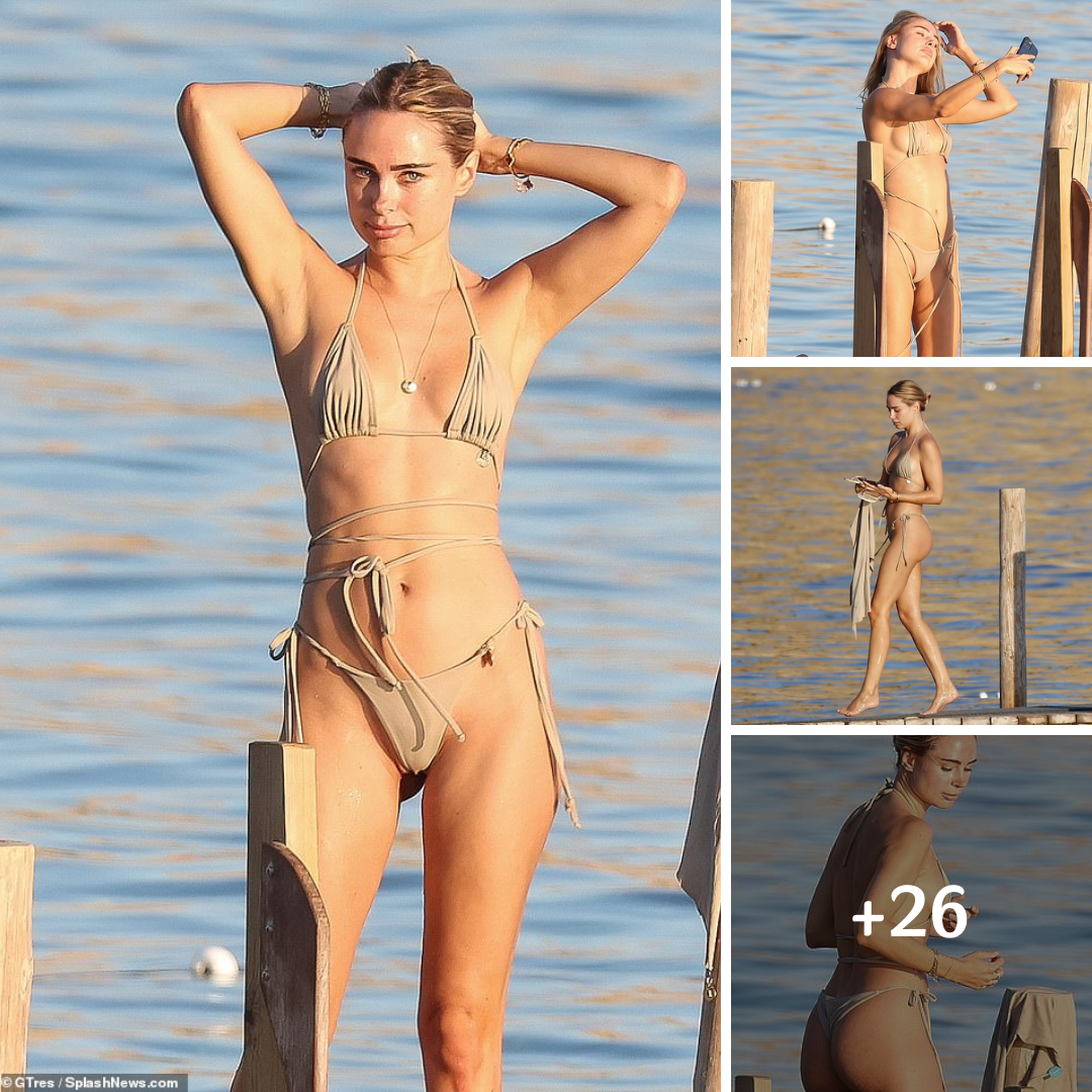 Kimberley Garner shows off her toned physique in a skimpy beige bikini in Ibiza with a mystery man