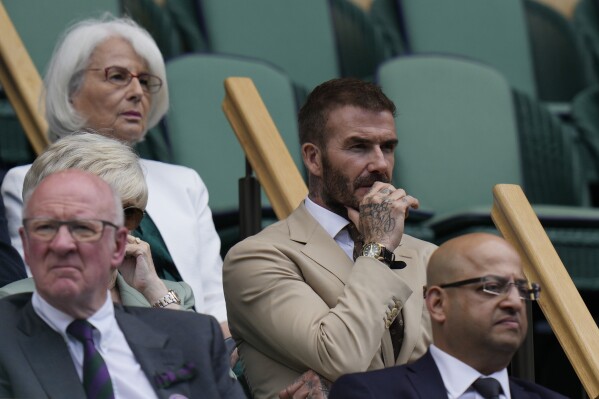 David Beckham sits in the Royal Box on Centre Court on day three of the Wimbledon tennis championships in London, Wednesday, July 5, 2023. (AP Photo/Alastair Grant)