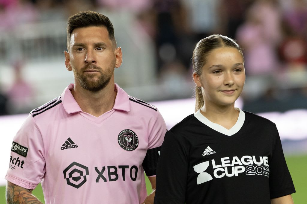 harper beckham on pitch with lionel messi 