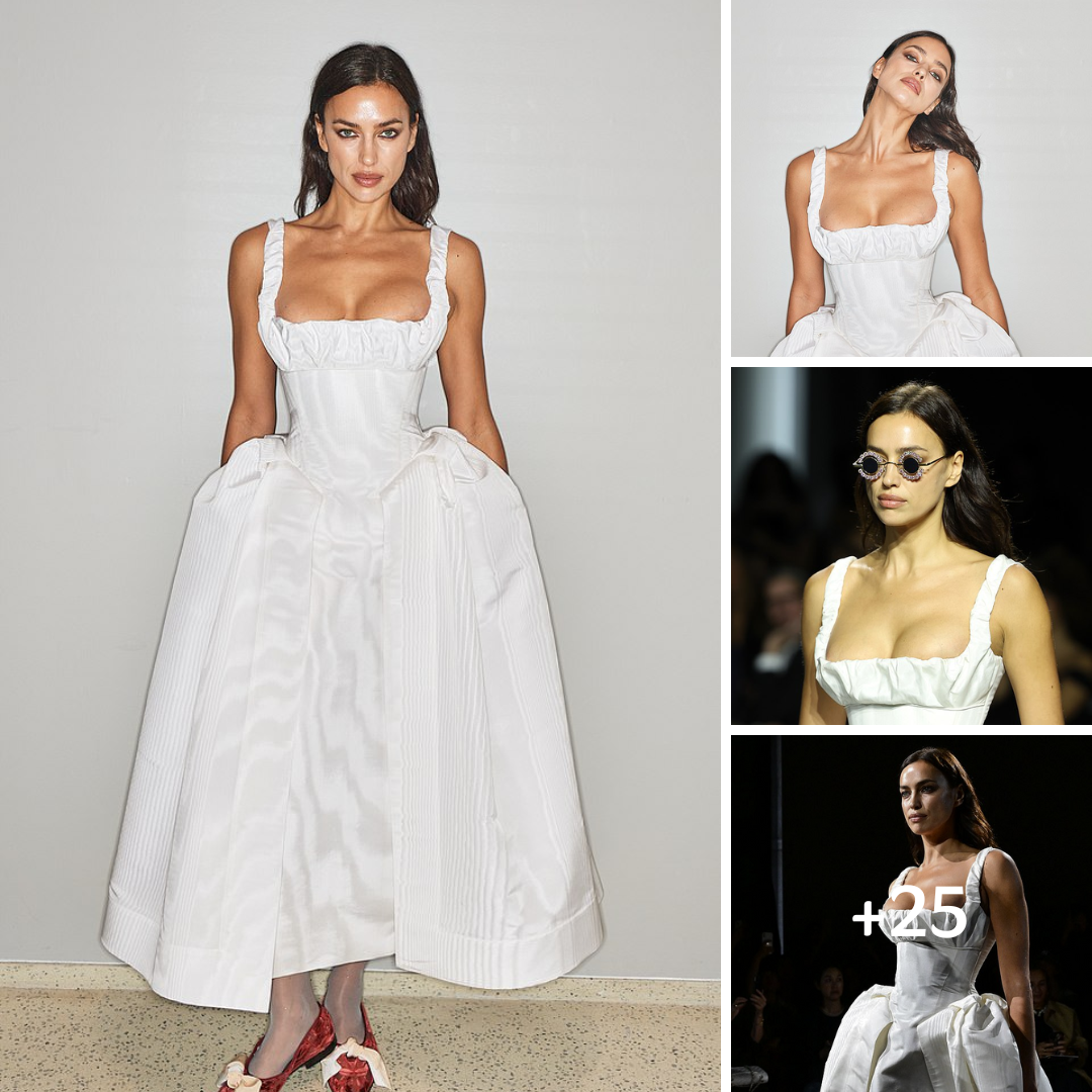 Irina Shayk puts on a busty display in a white corseted gown as she walks the runway for Vivienne Westwood’s Paris Fashion Week show