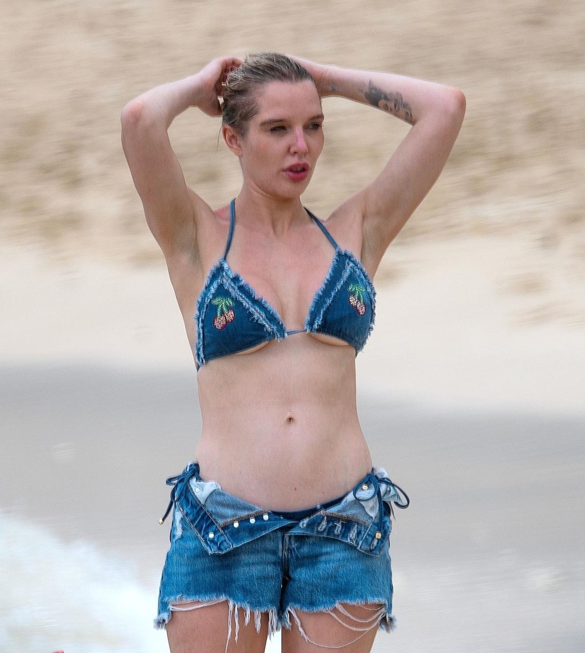 Helen Flanagan flashes underboob in a skimpy denim bikini top and matching  miniskirt on holiday | The Sun