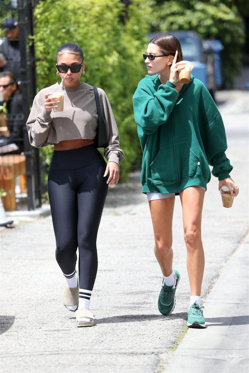 Hailey Bieber and Lori Harvey are seen leaving nepo cafe