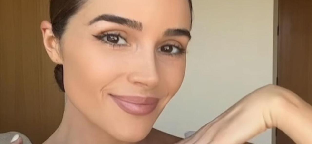 Olivia Culpo All Smiles With Bikini Top Falling Down