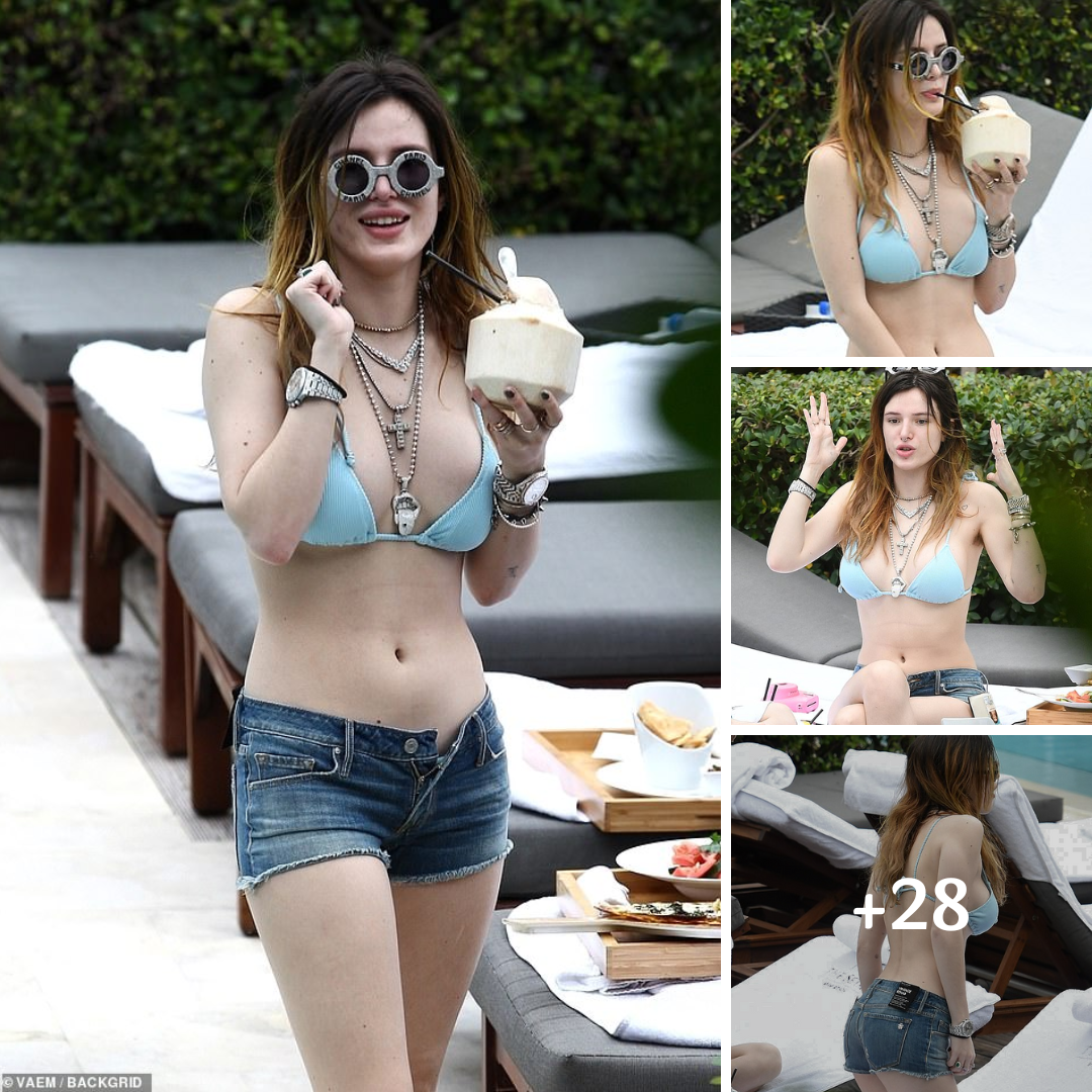 Bella Thorne dons a blue bikini top and denim shorts to lounge by the pool with sister Dani in Miami