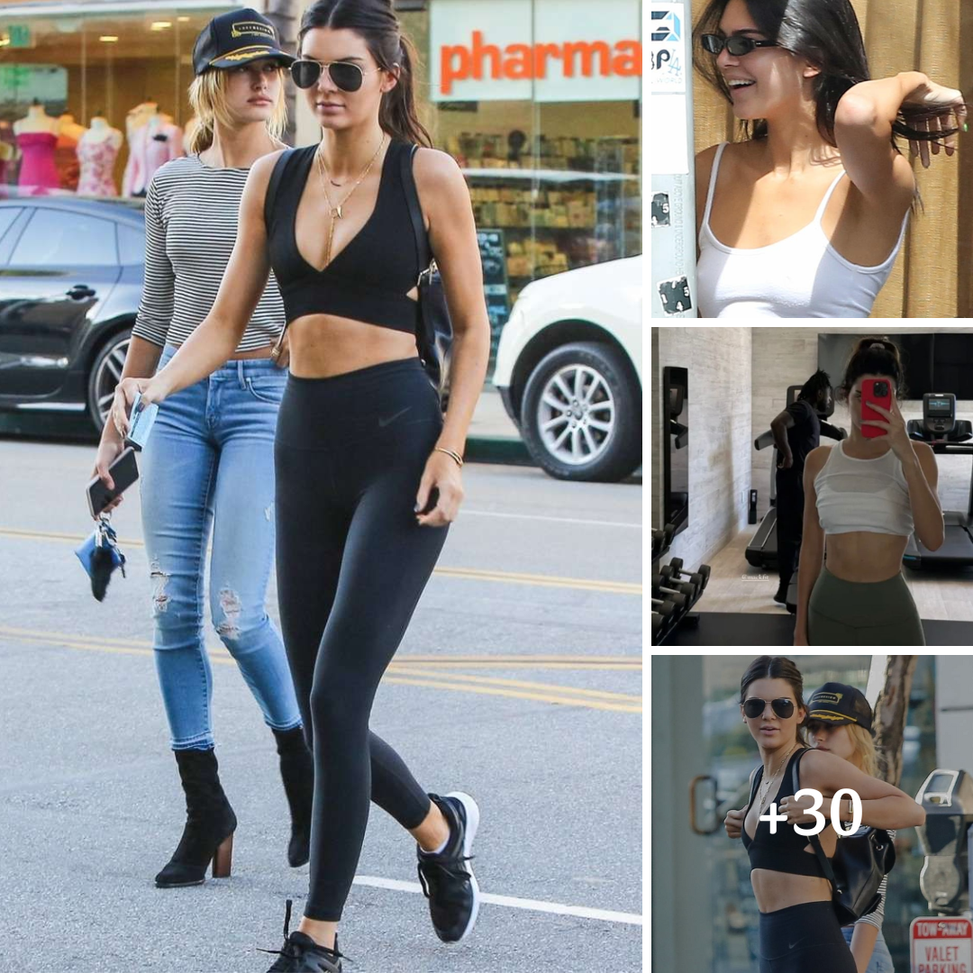 Kendall Jenner shows off toned abs as she slips into sports bra and tight shorts