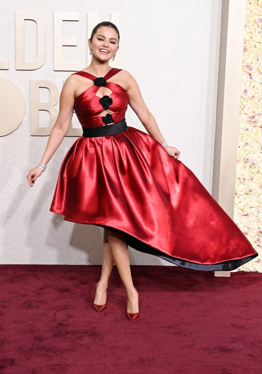 Selena Gomez flaunts curves at the Golden Globes 2024 in red cutout dress