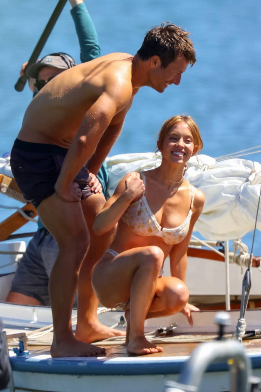 sydney sweeney stuns in a floral print bikini while filming her upcoming rom-com with glen powell on a yacht in sydney, australia-updt-080323_16