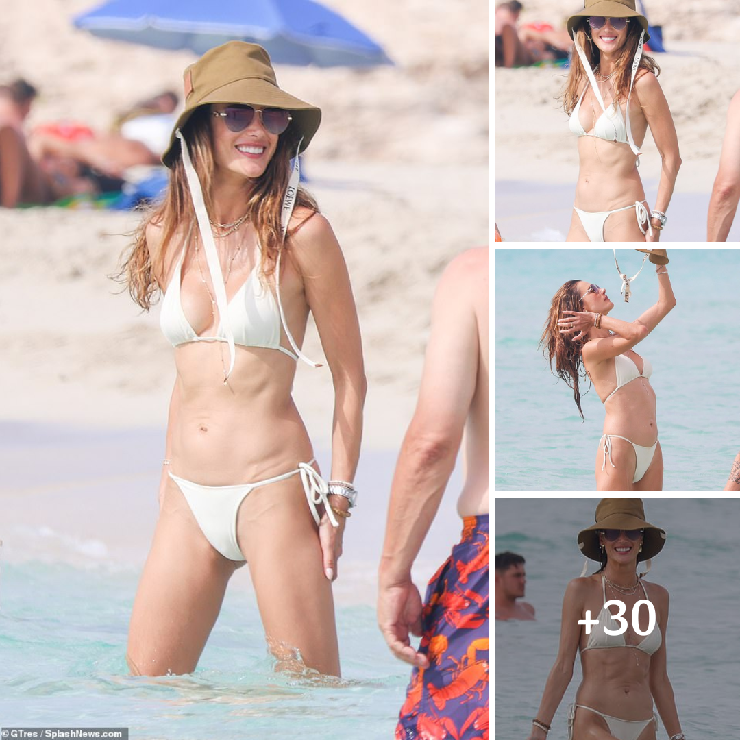 Alessandra Ambrosio, 42, sets pulses racing as she shows off her washboard abs in a tiny white bikini while soaking up the sun in Ibiza