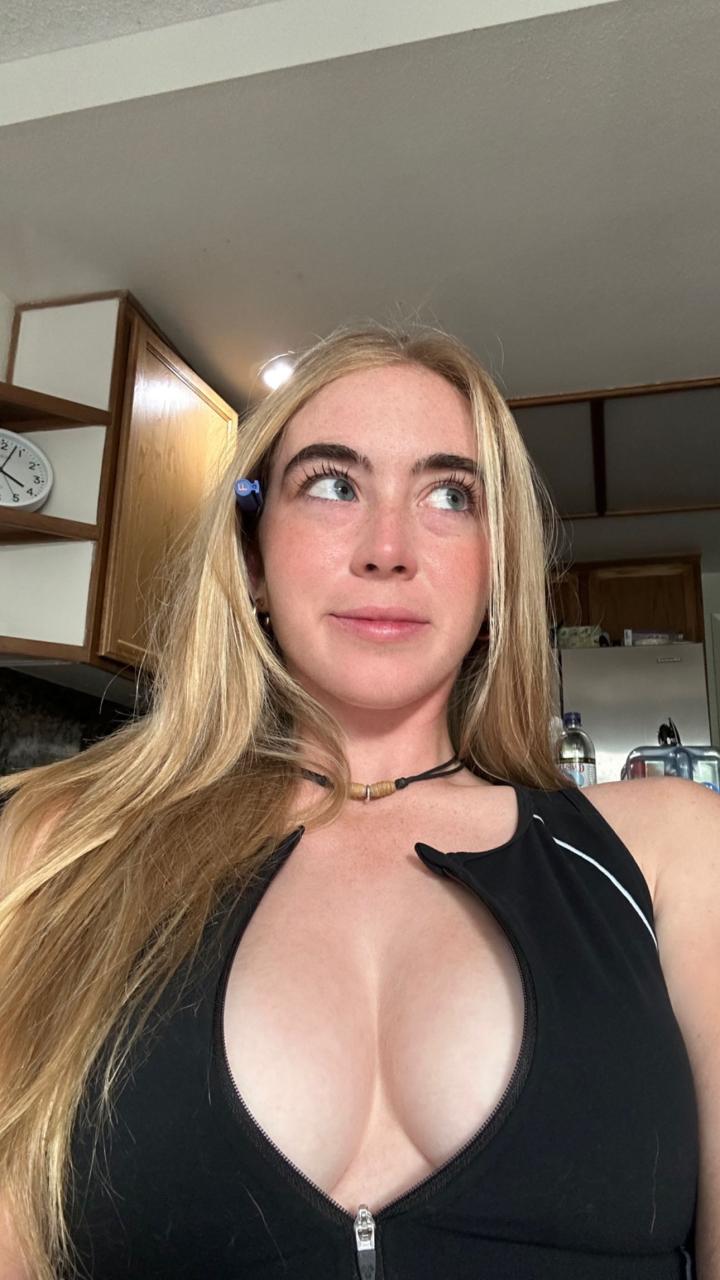 Grace Charis posted a snap of herself to Instagram of her zipped-down black top