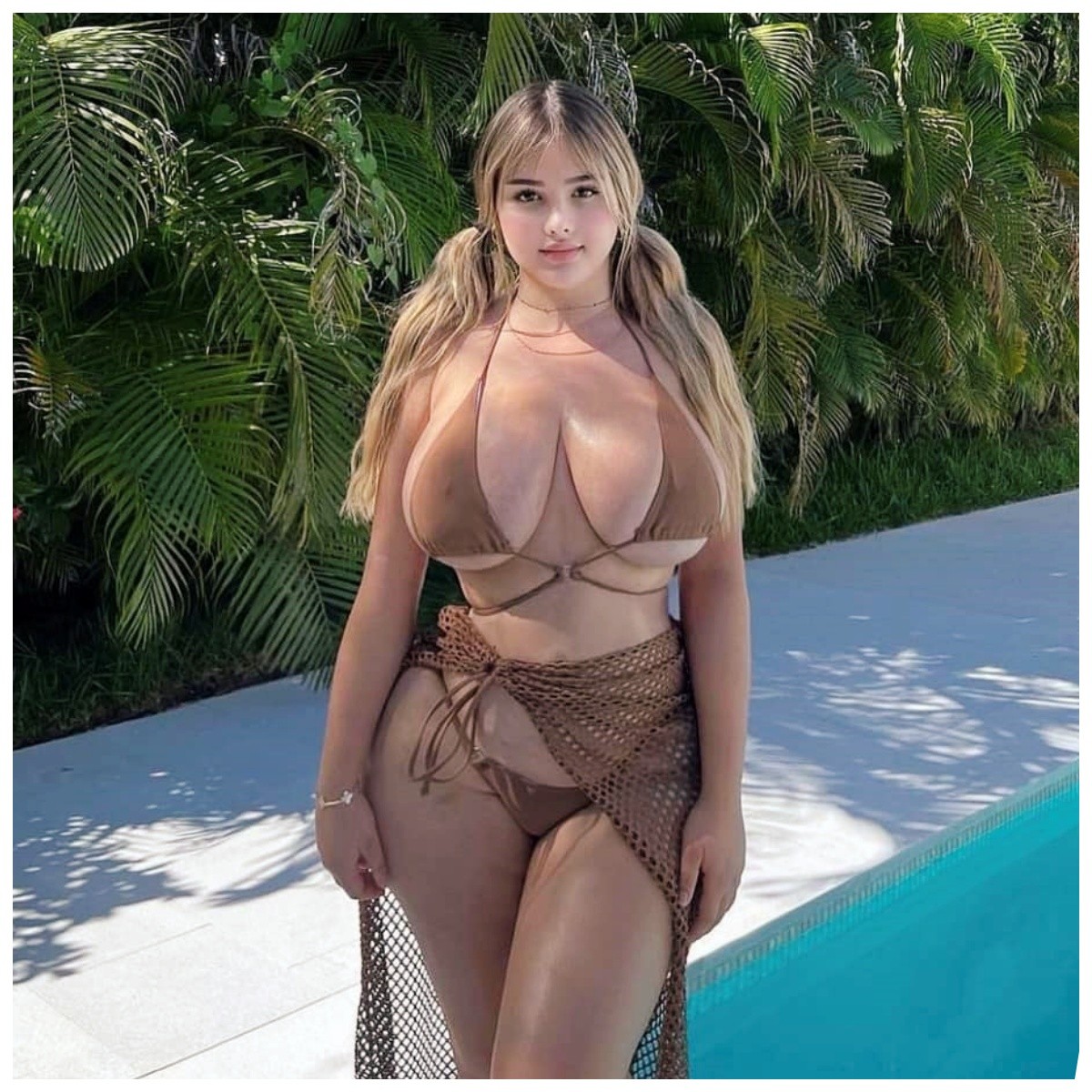 Immerse yourself in sweet charm embrace Anastasiya Kvitko’s enchanting aura and flawless silhouette ‎