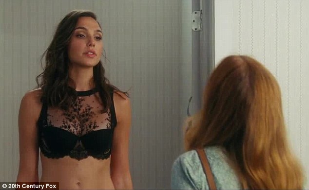 Wow factor: Gal Gadot stripped down to lingerie in the funny first trailer for Keeping Up With The Joneses released on Wednesday