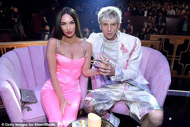 'They are very hot and cold': Megan Fox and Machine Gun Kelly are pictured in LA in May 2021