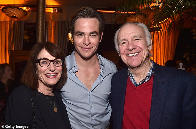 Family affair: Leading man Chris brought his parents Gwynne Gilford and Robert Pine to the celebration 