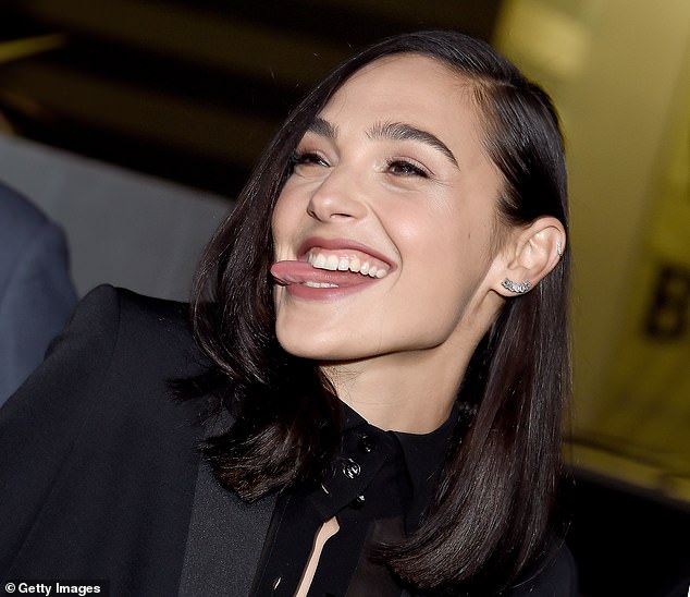 Good vibes: Gal playfully stuck her tongue out 