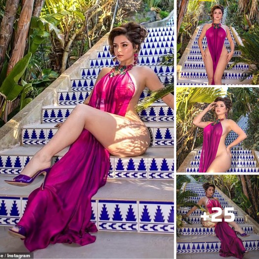 Demi Rose Stuns in a Revealing Purple Maxi Dress, Showcasing Her Gorgeous Curves ‎