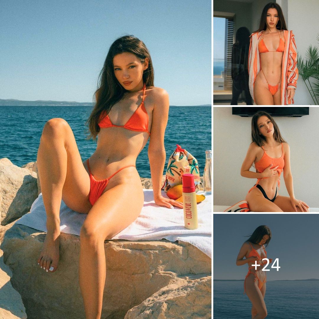 Irresistible on Miami Beach: Miss Bo Radiates Confidence in Her Gorgeous Orange Swimsuit. ‎