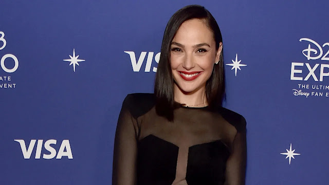 Gal Gadot shines in yet another stunning outfit that exudes elegance and confidence.