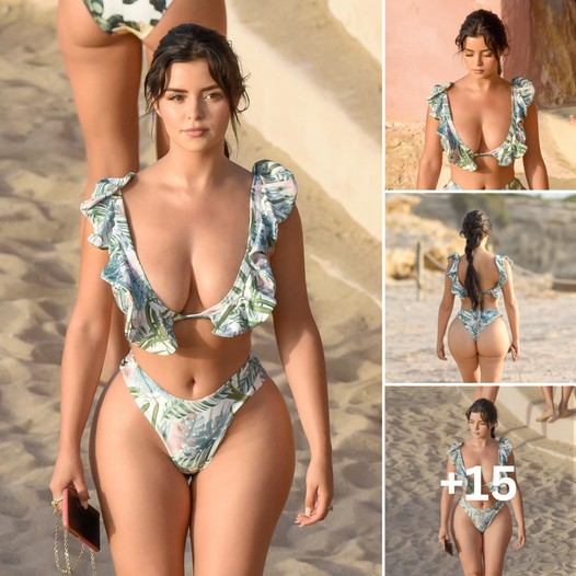 Demi Rose Flaunts Tropical Vibes: Striding Along Ibiza’s Beach in Exquisite Print Swimwear ‎