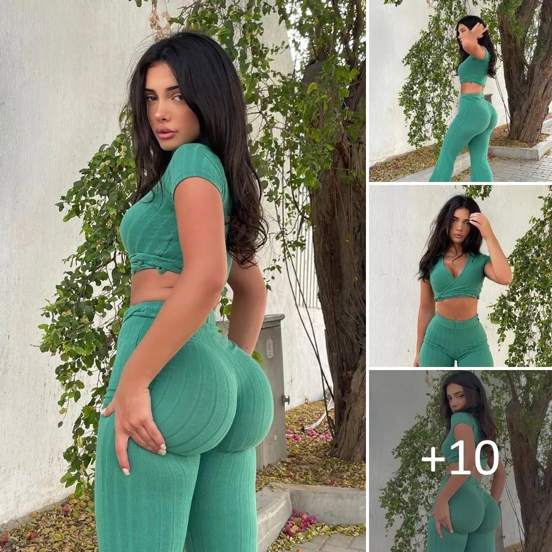 Melissa shows off cleαvαge in green tone ƄoԀ‌y suit